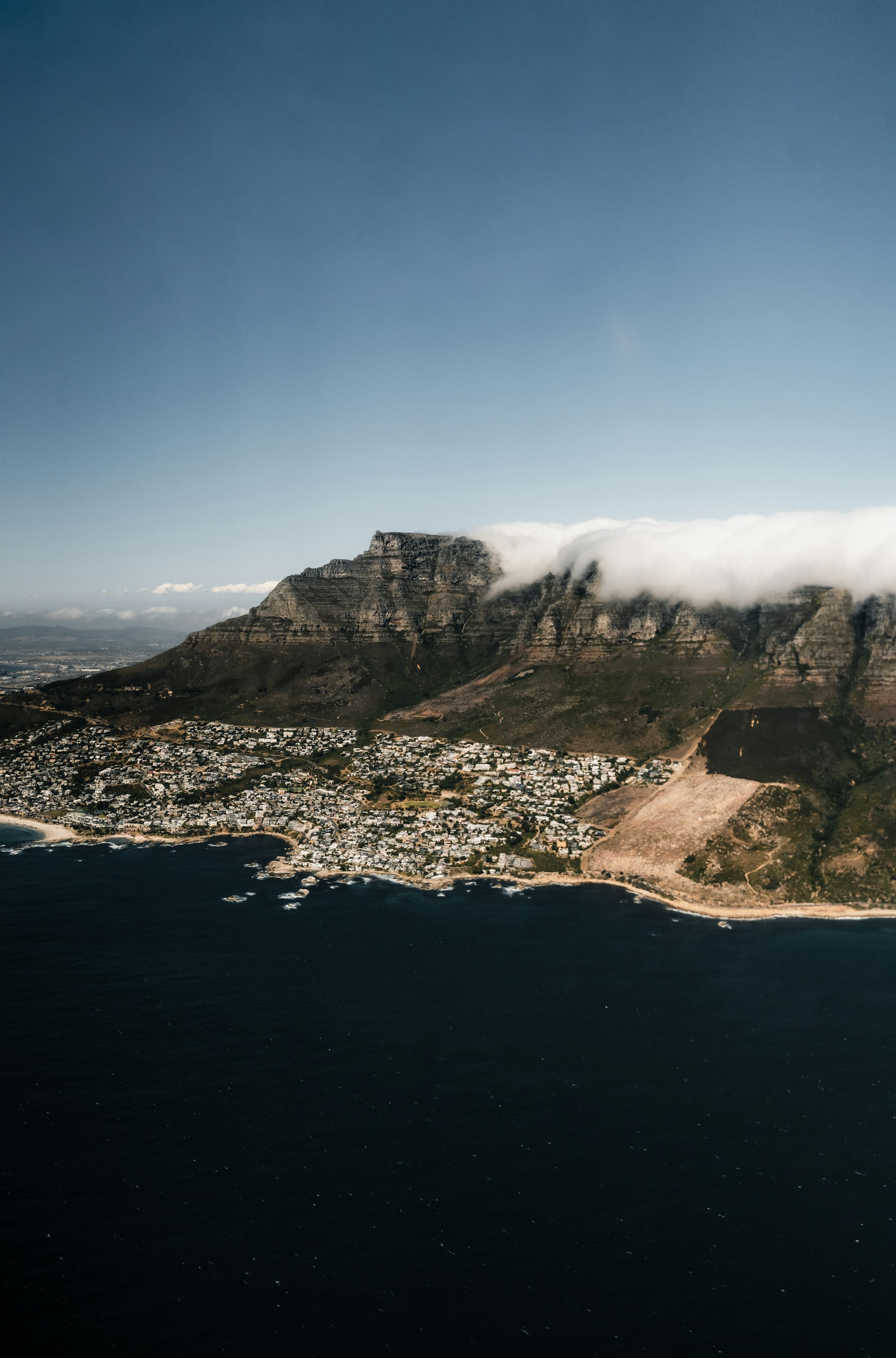 Aerial view of Cape Town and its Atlantic coastline at golden hour